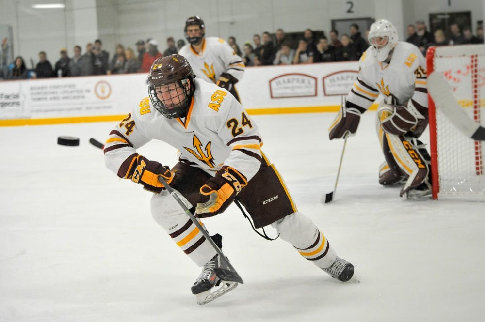 Freshman defender Liam McGing races for the puck on Saturday, Feb. 28, 2016 at Oceanside Ice Arena. ASU tied the U.S. National&nbsp;18-U team 2-2.