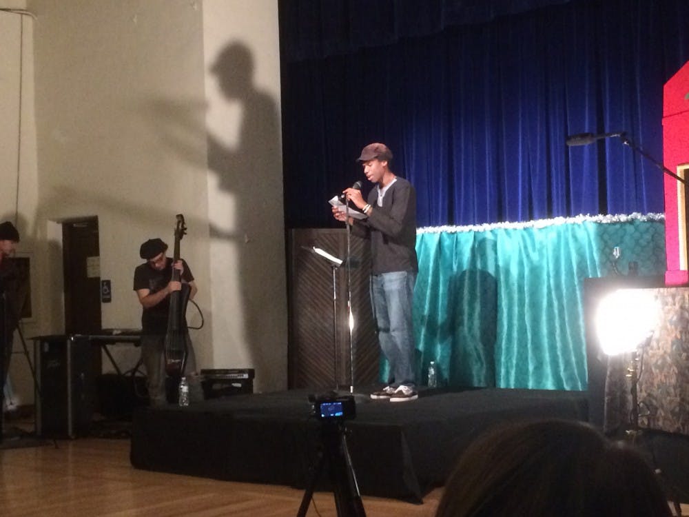 JC Koffy reads poetry at the Second annual Rise! Poetry Event in downtown Phoenix on Dec. 4, 2015. &nbsp;