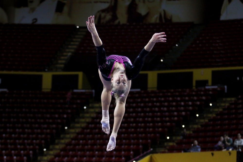 ASU senior Beka Conrad performs on the beam in a gymnastics meet against Stanford at the Wells Fargo Arena in Tempe, Ariz. on Saturday Feb. 18, 2017. Stanford posted a 195.200 - 195.775 victory over ASU.