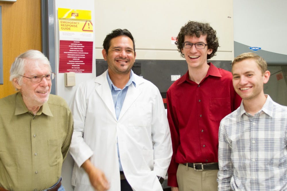 From left, Paul Coleman and&nbsp;Diego Mastroeni&nbsp;pose for a photo&nbsp;with student composers Zachary Bush and Stephen Mitton in a&nbsp;lab on Monday, March 27, 2017. The students have each composed a five-minute piece inspired by Alzheimer's disease research that will be presented at the "Science Exposed" event on Wednesday, April 23, 2017.
