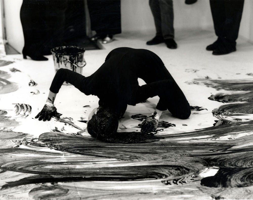 Janine Antoni’s enactment of Loving Care. Photo courtesy of Covers and Citations.