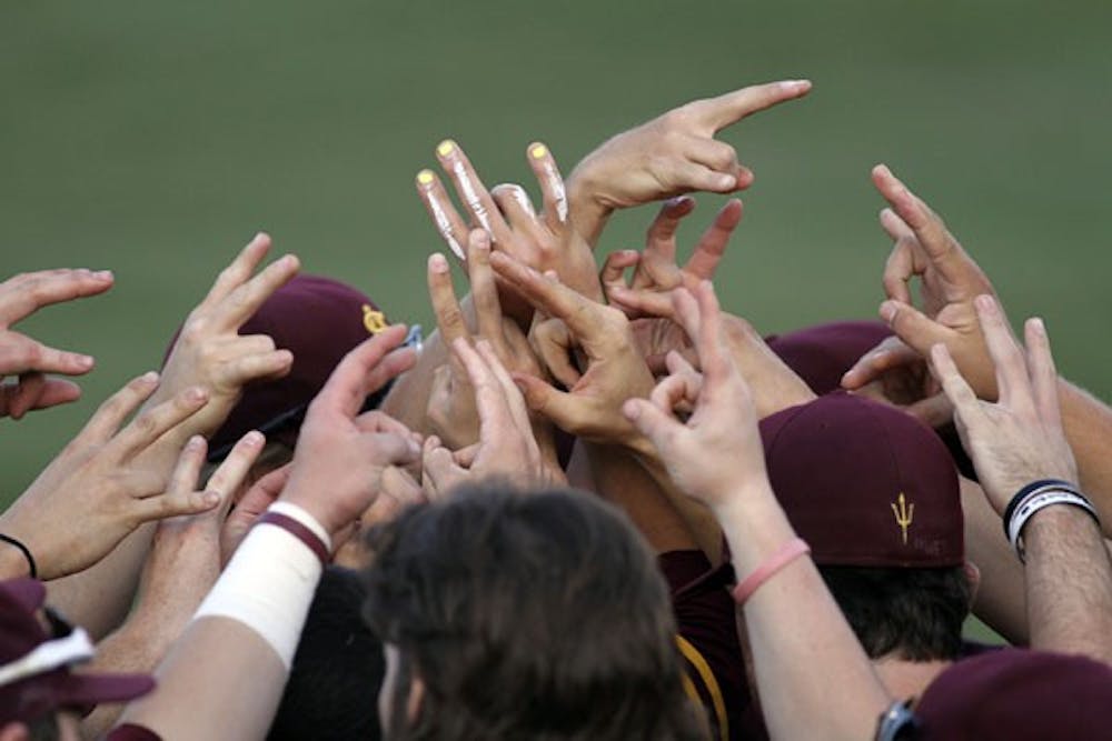 The ASU Baseball team throw up their pitchforks after defeating Oregon State on April 6 (Photo by Sam Rosenbaum)