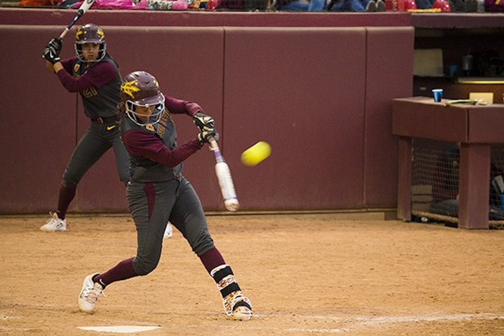 Softball-Toledo-Chelsea-Gonzales: Sophomore shortstop Chelsea Gonzales hits a home run in a game against Toledo on Saturday, Feb. 28, 2015, at Farrington Softball Stadium in Tempe. Gonzales' home run contributed to a in 11-2 victory over the Rockets. (Shiva Balasubramanian/The State Press)
