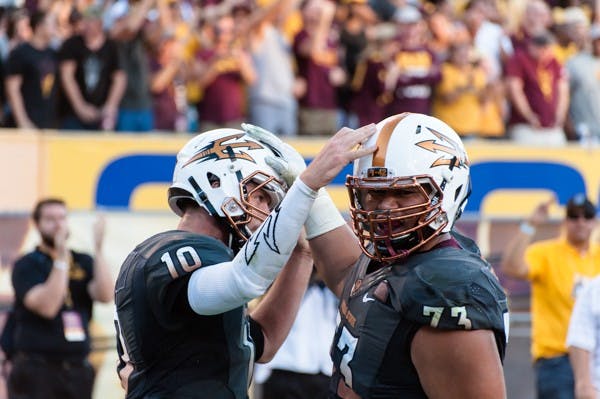 , Saturday, Nov. 8, 2014 at Sun Devil Stadium in Tempe. (Photo by Ben Moffat)