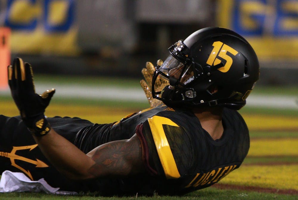 Redshirt senior wide receiver Devin Lucien (15) reacts after a questionable penalty in the third quarter against Colorado on Saturday, Oct. 10, 2015, at Sun Devil Stadium in Tempe. The Sun Devils defeated the Buffaloes 48-23.