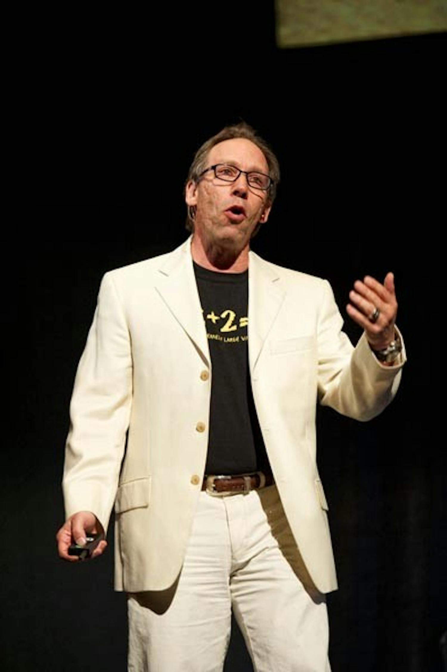 THE GREAT DEBATE: Lawrence Krauss, a physicist and director of ASU's Origins Project, discusses science's contribution to values of right and wrong during The Great Debate, held Saturday night in Gammage Auditorium. A panel of philosophers and ethicists gathered to debate the role of science in ethical judgments. (Photo by Michael Arellano)
