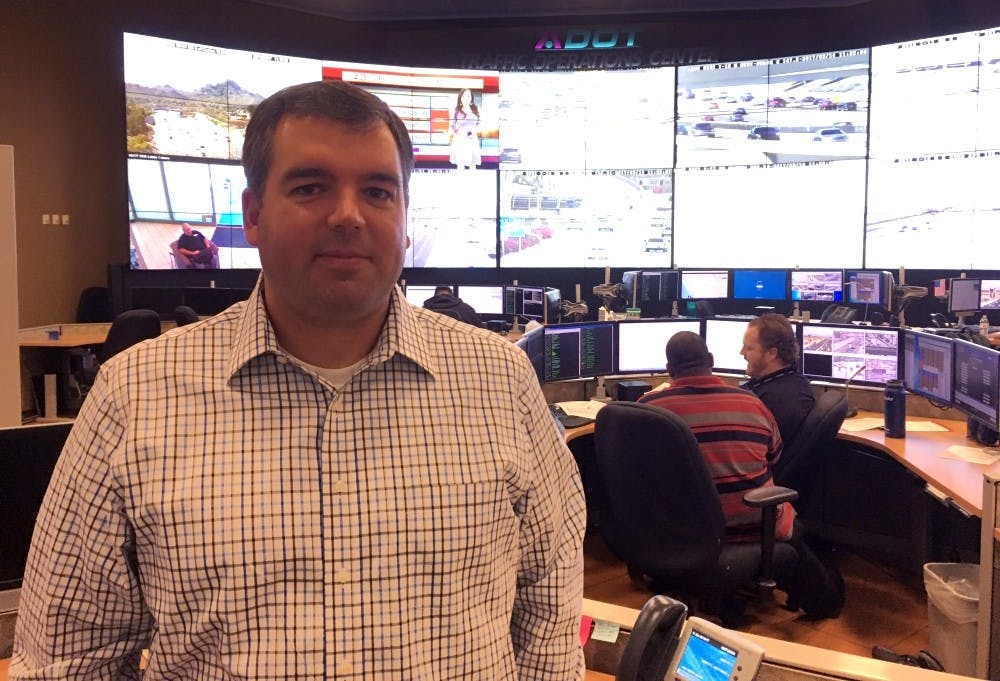 Arizona Department of Transport Transportation spokesperson Doug Pacey in the  ADOT monitoring room on Tuesday, March 14, 2017.