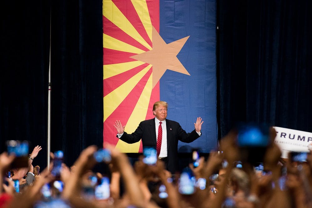 Presidential candidate Donald Trump takes the stage on Saturday, July 11, 2015, at the Phoenix Convention Center. Trump gave a speech focused on illegal immigration.