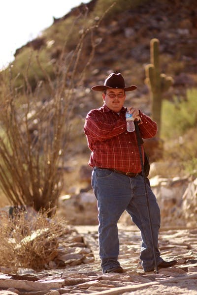 ROUGHING IT: ASU instructor, Scott Kozakiewicz, discusses outdoor survival techniques and the upcoming semester Sunday afternoon in Piestewa Peak Park. (Photo by Lillian Reid)