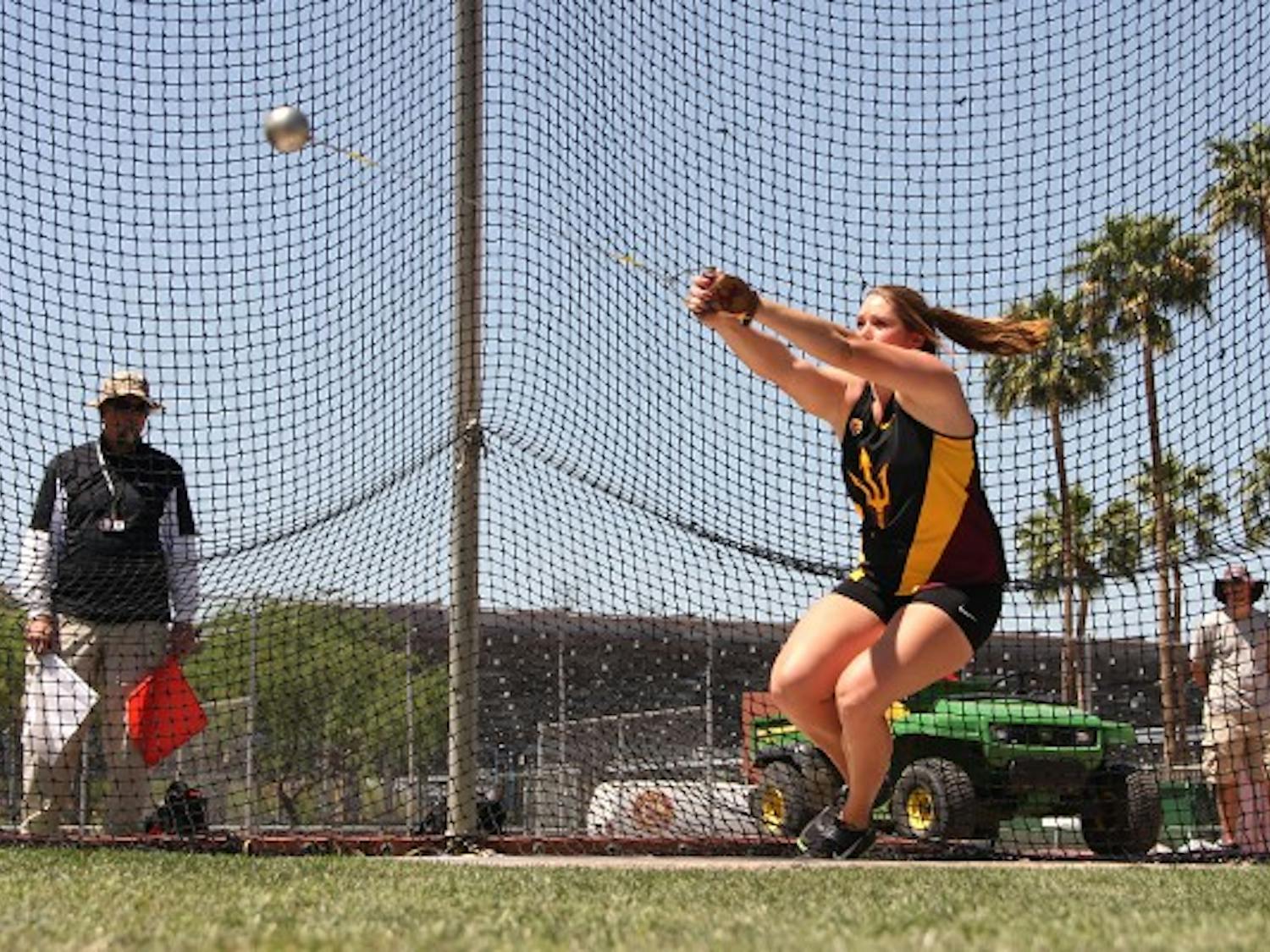 Redshirt junior Chelsea Cassulo rotates her body one more time before letting go in the hammer throw competition in the Sun Angel Classic on April 5. Cassulo earned her eighth win in the last nine meets this weekend. (Photo by Abhiram Chandrashekar)