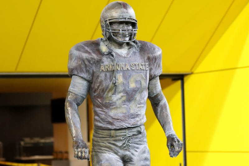 A statue of Pat Tillman stands watch over the field at Sun Devil Stadium in Tempe on Thursday, Sept. 2, 2021.