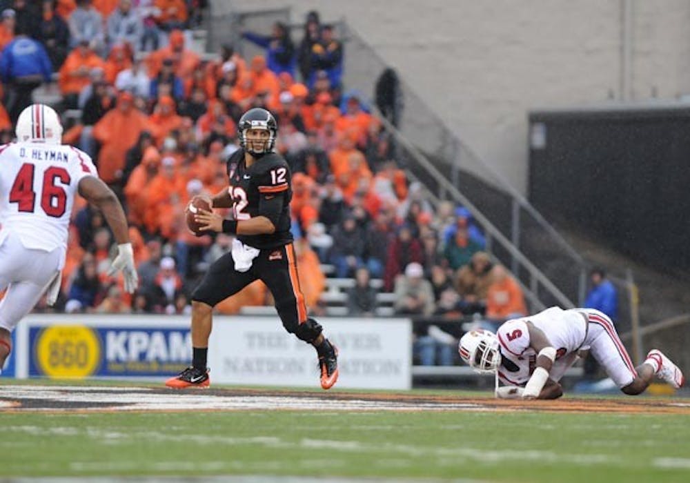 PROTECTIVE PASSER: Oregon State sophomore quarterback Ryan Katz looks for a receiver against Louisville earlier this season. Katz is yet to throw an interception through three games. (Photo Courtesy of The Daily Barometer)