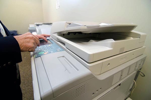 SAVE THE TREES: A recent study from ASU and Canon discovered that if ASU prints double-sided, as opposed to single-sided, 3,500 trees could be saved each year. (Photo by Aaron Lavinsky)