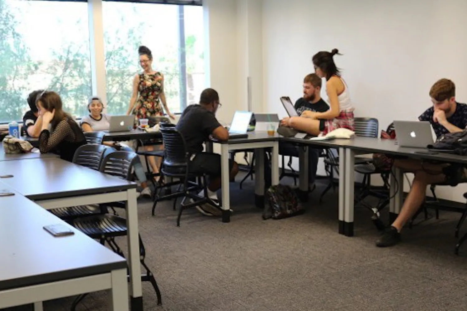Rosemarie Dombrowski’s intermediate poetry workshop preparing for their community art project on Thursday, Aug. 25, 2016, at the downtown ASU campus. 