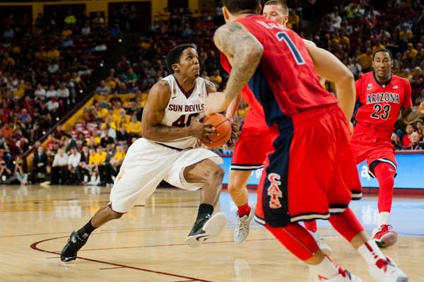 Senior forward Shaquielle McKissic drives to the basket against Arizona, Saturday, Feb. 7, 2015 at Wells Fargo Arena in Tempe. The Sun Devils defeated the Wildcats 81-78. (Ben Moffat/The State Press)