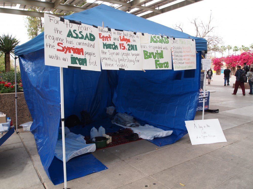 A mock Syrian refugee tent was set up on March 19, 2015 in the Memorial Union on the ASU Tempe campus to inform students about conflicts in Syria. (Kaitlyn Ahrbeck/The State Press)