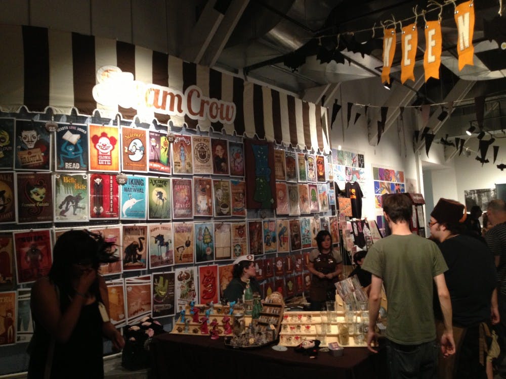 Steam Crow's booth attracted the most people with their festive art. Photo by Alec Damiano.