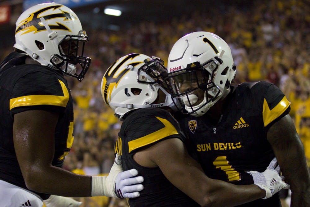 Arizona State freshman wide receiver N'Keal Harry (right) celebrates with his teammates after his first half touchdown in the game versus Texas Tech in Sun Devil Stadium in Tempe, Arizona, on Saturday, Sept. 10, 2016.
