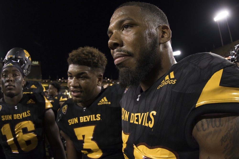 Redshirt senior linebacker Antonio Longino (32) celebrates with teammates after the game against Colorado on Saturday, Oct. 10, 2015, at Sun Devil Stadium in Tempe. The Sun Devils defeated the Buffaloes 48-23.