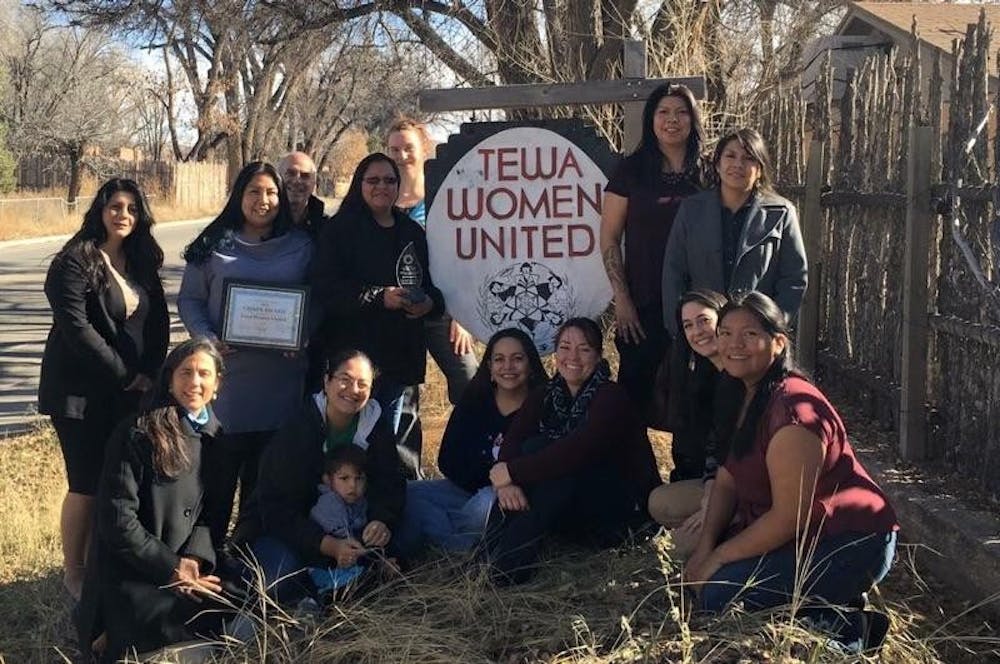 Tewa Women United pictured as the group received the Chispa Award.&nbsp;