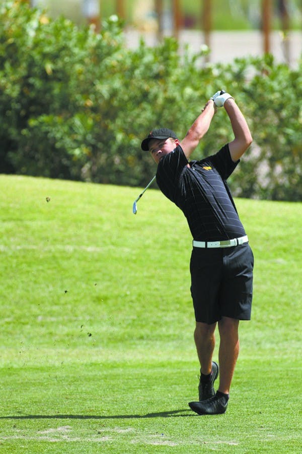Sophomore Mathias Schjoelberg hits a shot from the fairway during the ASU Thunderbird Invitational last April. (Photo by Sam Rosenbaum)
