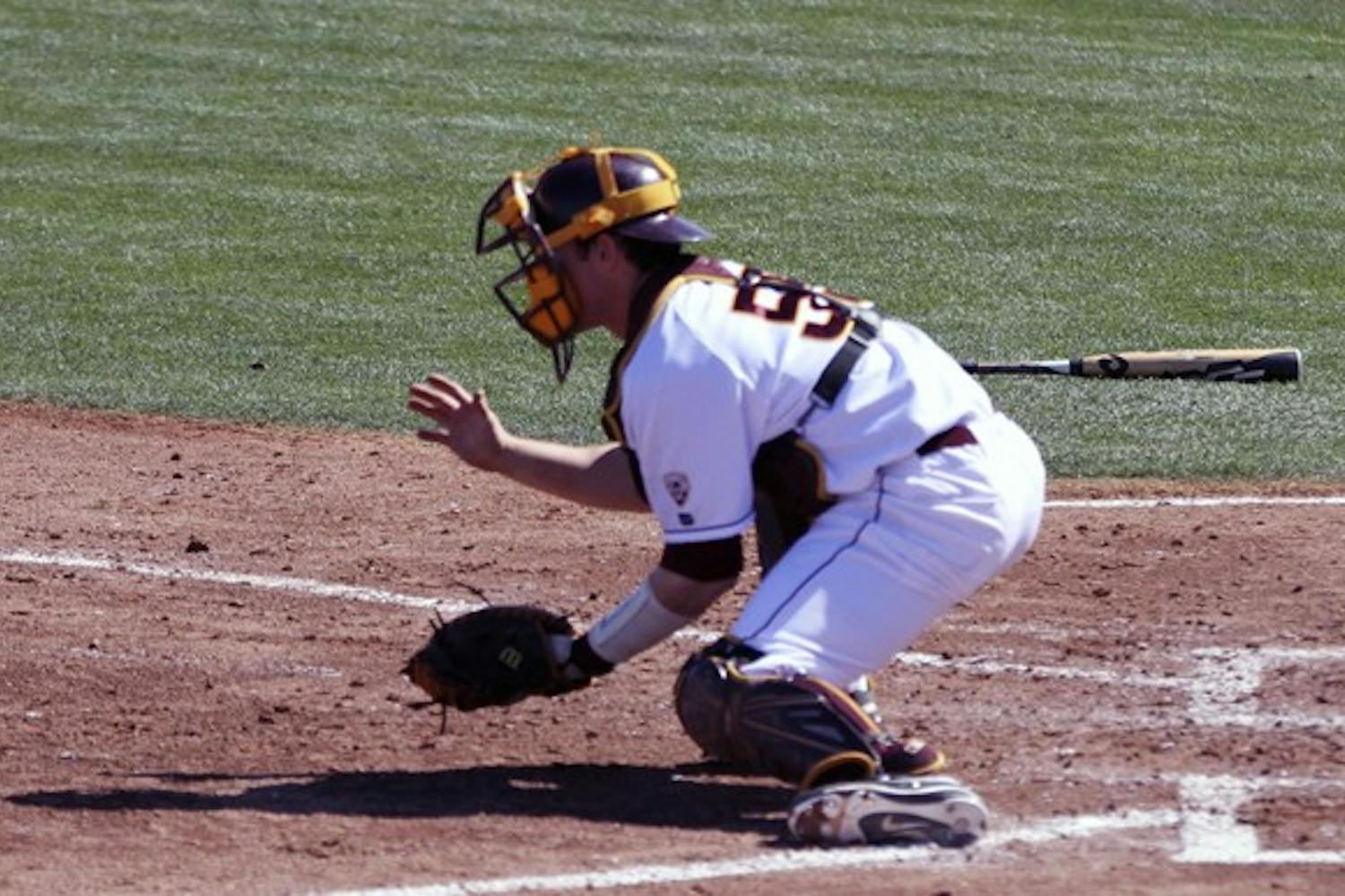 SUN DEVIL SWEEP: Senior outfielder/pitcher Kole Calhoun goes for a hit in last week's game against Northern Illinois. The Sun Devils played four games against Towson this week, sweeping them in each game. (Photo by Scott Stuk)