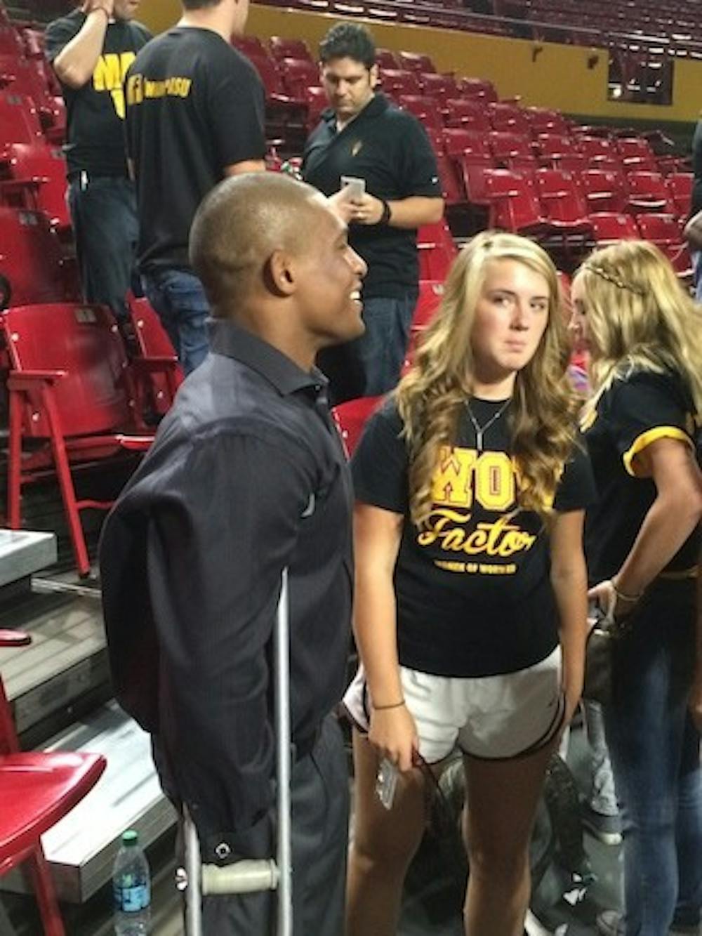 Anthony Robles chats with students after the "Rally For Respect" at Wells Fargo Arena on Thursday.