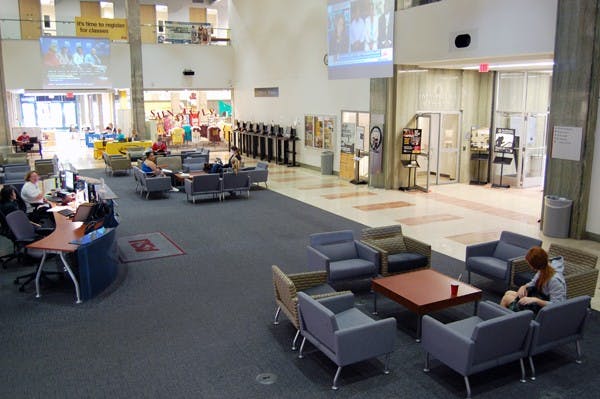 Students fill seats of the University Center lobby Tuesday morning. Downtown students, faculty and staff saw a decreased transient presence in University Center since a campus policy aimed at removing "non-ASU affiliated" individuals was implemented in March. (Photo by Thania A. Betancourt)