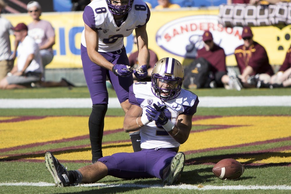 Washington freshman tail back Myles Gaskin (9) reacts after a pass for a big gain in the second quarter against Arizona State on Saturday, Nov. 14, 2015, at Sun Devil Stadium in Tempe. 