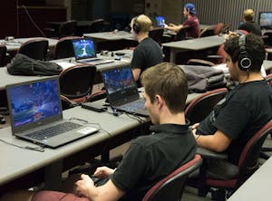Chase C (center) and FloppinSonofaFish (right) compete in the Rocket Devil Arena tournament at Arizona State University in Tempe, AZ, on November 10, 2016.