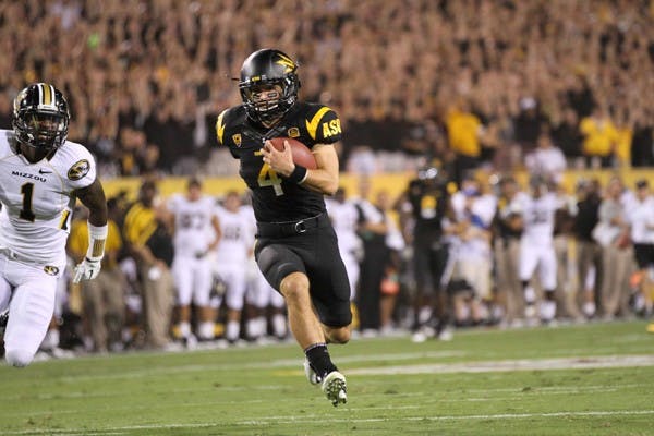 IT PAYS OFF: Senior wide Receiver Aaron Pflugrad heads for the end zone during the Sun Devils’ win over Mizzou on Friday. Pflugrad’s success this season is attributed to the hard work the senior put in over the summer. (Photo by Lisa Bartoli)