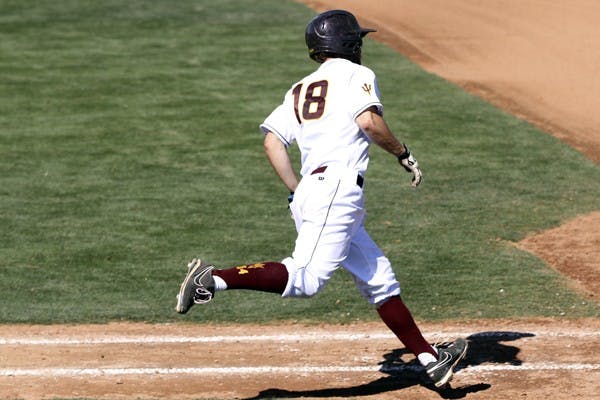 Joey DeMichele rounds first base in a game against UC Riverside on Feb. 26. DeMichele tied a career-high five RBI in Thursday’s victory over Saint Louis. (Photo by Sam Rosenbaum)