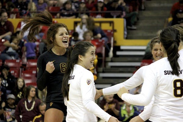 Junior libero Stephanie Preach (6) celebrates with her teammates during a game last season. The Sun Devils look to improve last season’s 9-22 record after picking up a decorated recruiting class over the offseason. Photo by Sam Rosenbaum
