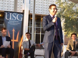 Tempe Undergraduate Student Government elections commissioner Anthony Zlaket moderates the USG&nbsp;debate held in the North Plaza of the Memorial Union on Wednesday, March 23, 2016.