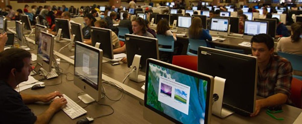 Large computing commons like this one at the Tempe campus show students have a need for online resources. The University is looking to develop its own MOOCs, massive online courses offered without credit at schools like Columbia, to keep up with changes in education and technology. (Photo by Vince Dwyer)