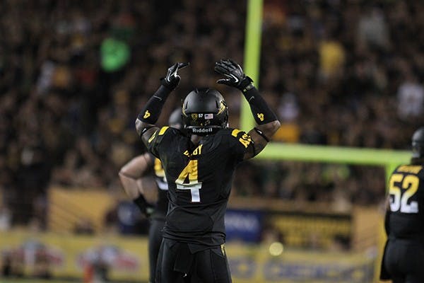 Senior defensive back Alden Darby gets the crowd pumped up at a home game in Sun Devil Stadium. This week, the Sun Devils travel to Utah to face the Utes. (Photo by State Press Staff)

