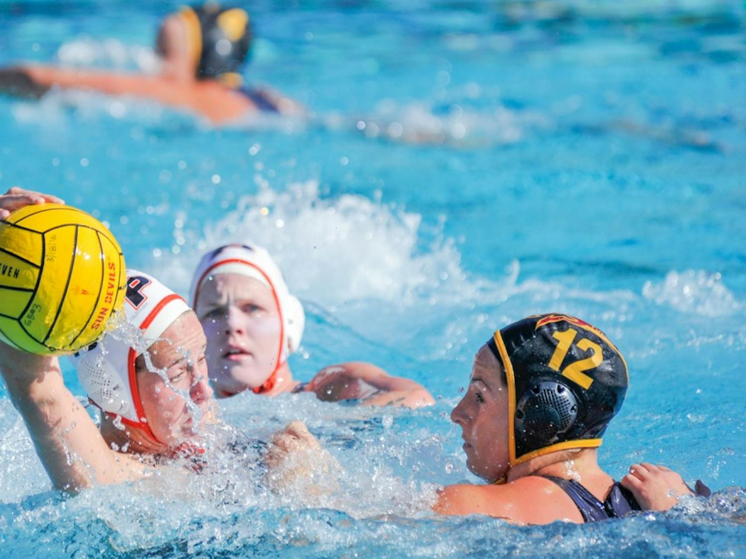 Senior Abbey Kerth goes head to head with the UofP offense during a match-up on Sunday, March 20, 2016, at the Mona Plummer Aquatic Complex in Tempe. 