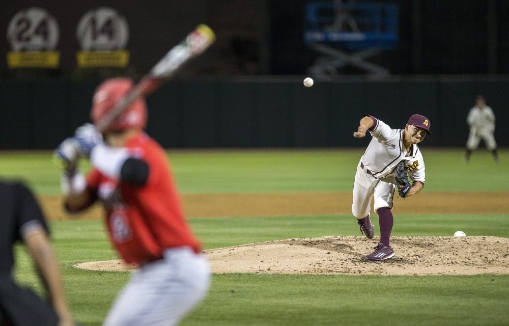 ASU baseball's Jordan Aboites pitches during a game against the University of Arizona Wildcats at Phoenix Municipal Stadium in Phoenix, Arizona, on Tuesday, April 12, 2016. 