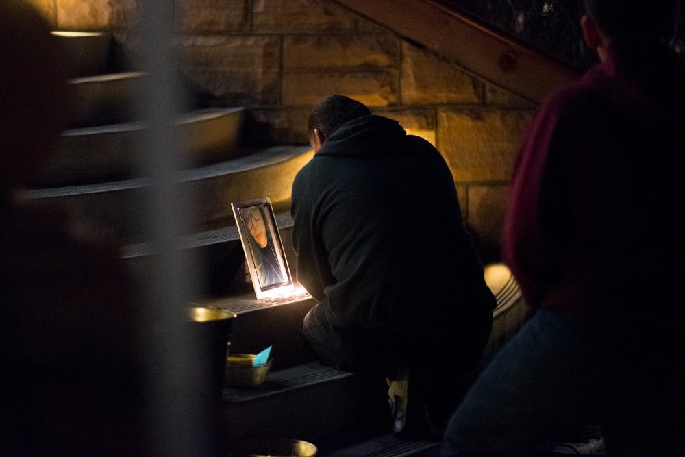 Bernardo Ruiz cries at a memorial for his niece Jelissa on Wednesday, Jan. 13, 2016, at Old Main on the Tempe campus.