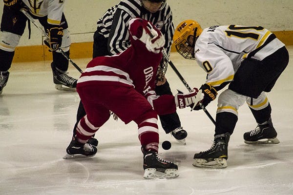 ASU's David Jantzie is trying to win the faceoff for the Sun Devils on Saturday, Jan. 11. ASU beat Oklahoma 3-2. (Photo by Alyssa Pakes)