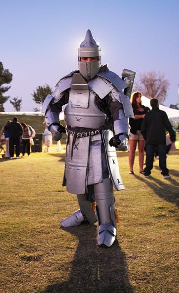 PARK PARTY: Nevada Lemus shows off his homemade costume at the Tempe Halloween festivities at Kiwanis Park on Saturday night. (Photo by Rosie Gochnour)