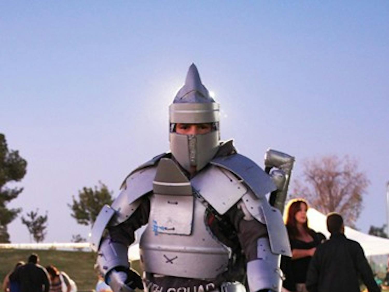 PARK PARTY: Nevada Lemus shows off his homemade costume at the Tempe Halloween festivities at Kiwanis Park on Saturday night. (Photo by Rosie Gochnour)