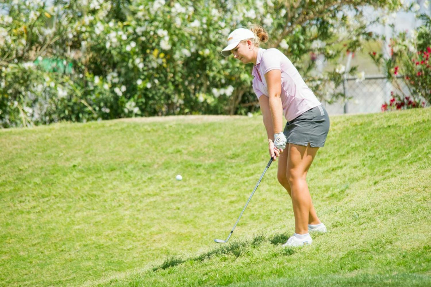 Then-freshman Linnea Strom chips her ball out of the rough on the fifth hole Friday, April 8, 2016 during the 2016 Ping ASU Invitational at Karsten Golf Course in Tempe, Arizona.