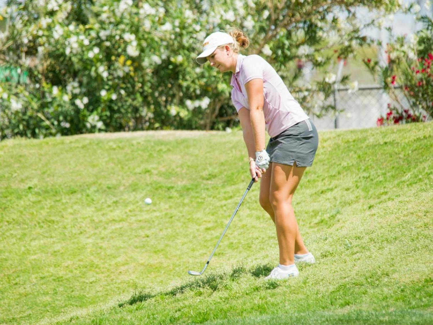 Then-freshman Linnea Strom chips her ball out of the rough on the fifth hole Friday, April 8, 2016 during the 2016 Ping ASU Invitational at Karsten Golf Course in Tempe, Arizona.