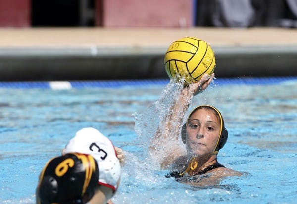 Mariam Salloum prepares to pass the ball in a game against San Diego State on March 3. Salloum, a senior, plans to return home to Germany after this year to attend graduate school and continue playing water polo. (Photo by Sam Rosenbaum)