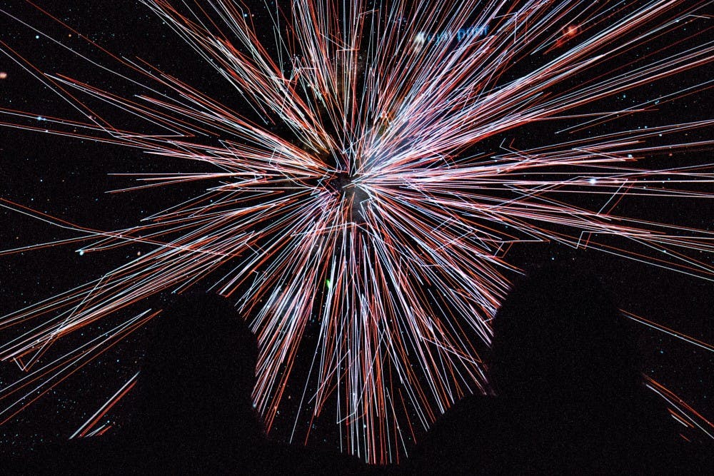A view of the universe being mapped out during a 3-D presentation is seen from behind two theatre-goers in the Marson Theater on the Tempe Campus on Wednesday, Sept. 14, 2016.