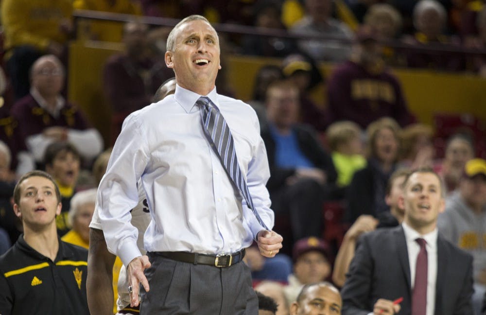 Sun Devil coach Bobby Hurley cheers during a game against the University of Washington Huskies in Wells Fargo Arena on Saturday, Jan. 16, 2015, in Tempe, Ariz. The Huskies won the matchup, 89-85.