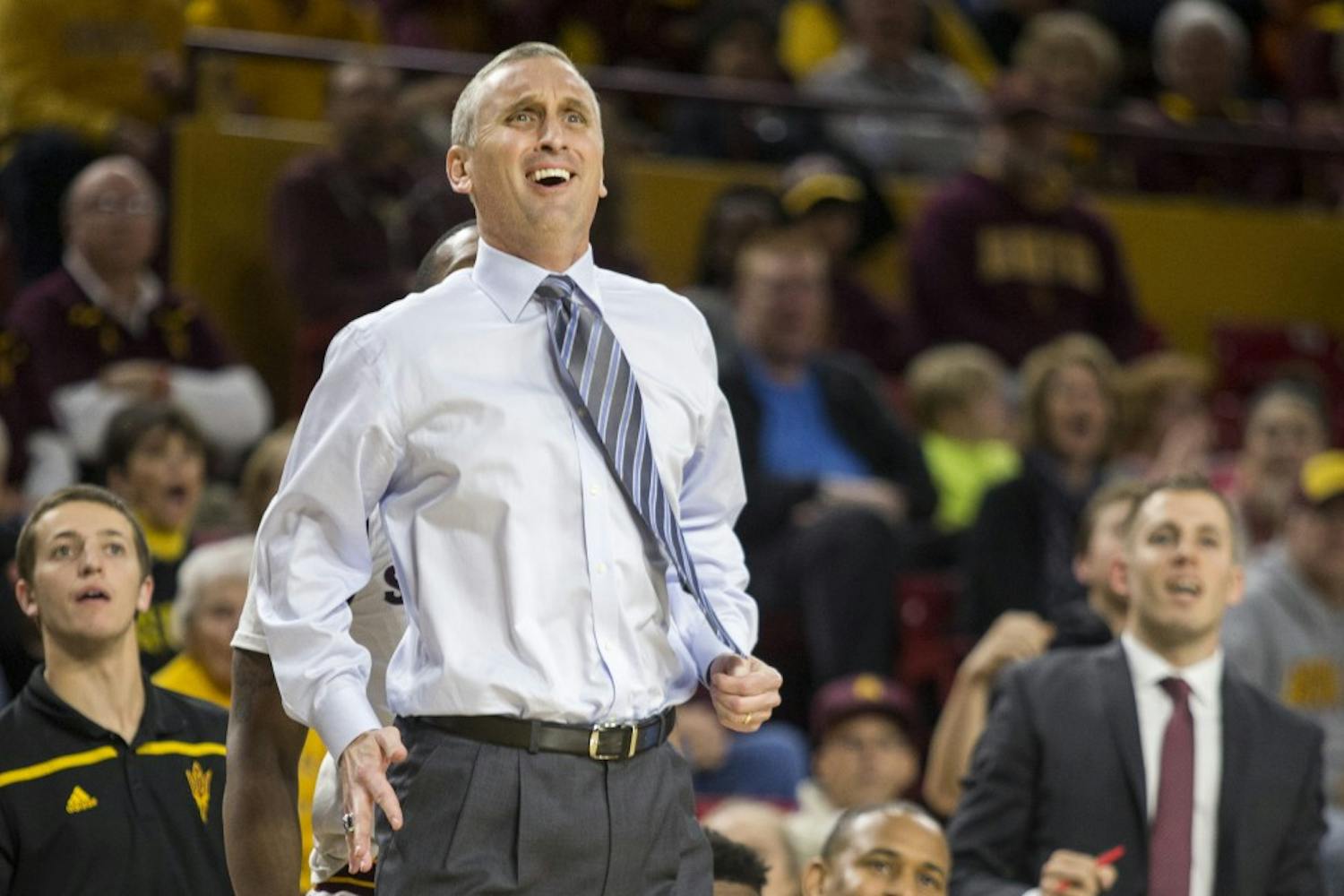 Sun Devil coach Bobby Hurley cheers during a game against the University of Washington Huskies in Wells Fargo Arena on Saturday, Jan. 16, 2015, in Tempe, Ariz. The Huskies won the matchup, 89-85.