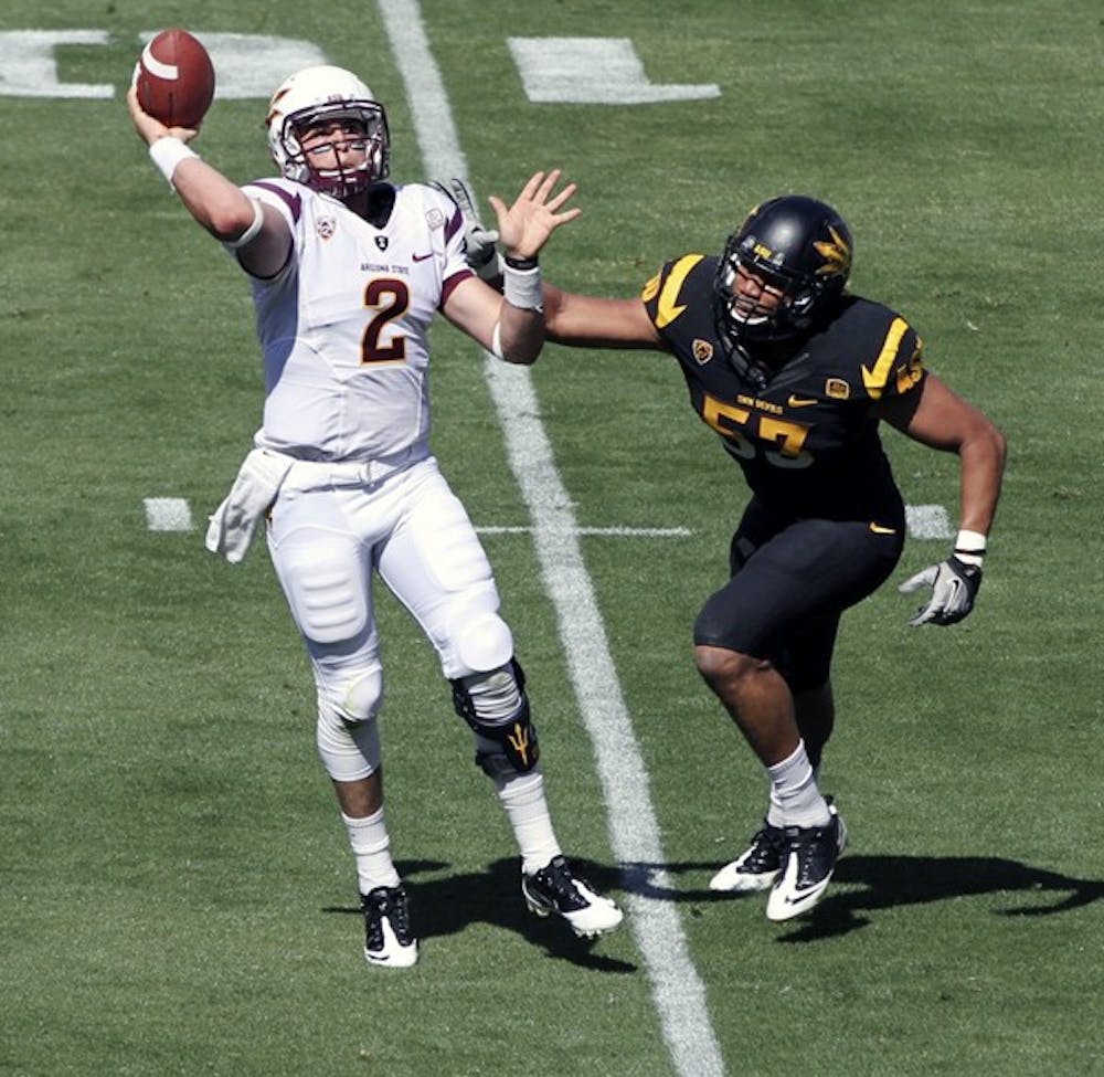 Mike Bercovici throws a pass in ASU’s scrimmage at Sun Devil Stadium Saturday. Bercovici is one of three quarterbacks competing for the starting position. (Photo by Sam Rosenbaum)