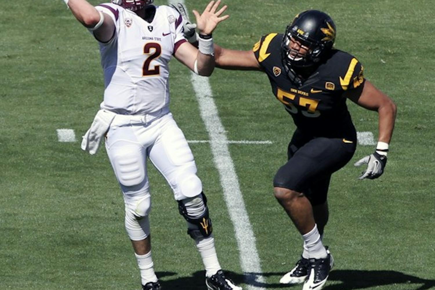 Mike Bercovici throws a pass in ASU’s scrimmage at Sun Devil Stadium Saturday. Bercovici is one of three quarterbacks competing for the starting position. (Photo by Sam Rosenbaum)
